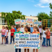Children holding Greek signs reading “Όλοι μαζί,” “Ίσες ευκαιρίες,” “Ένταξη,” and “Το δημόσιο σχολείο δεν μπορεί να λειτουργεί με λογικές διαχωρισμού και κατηγοριοποίησης.”