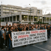Protesters outside the Ministry of Finance hold Greek banners reading “Η ΚΑΤΟΙΚΙΑ ΕΙΝΑΙ ΚΟΙΝΩΝΙΚΟ ΔΙΚΑΙΩΜΑ, ΟΧΙ ΕΜΠΟΡΕΥΜΑ. ΚΑΝΕΝΑΣ ΕΡΓΑΖΟΜΕΝΟΣ ΧΩΡΙΣ ΑΞΙΟΠΡΕΠΗ ΣΤΕΓΗ – ΚΑΝΕΝΑΣ ΦΟΙΤΗΤΗΣ ΧΩΡΙΣ ΔΙΚΑΙΩΜΑ ΣΤΙΣ ΣΠΟΥΔΕΣ!”